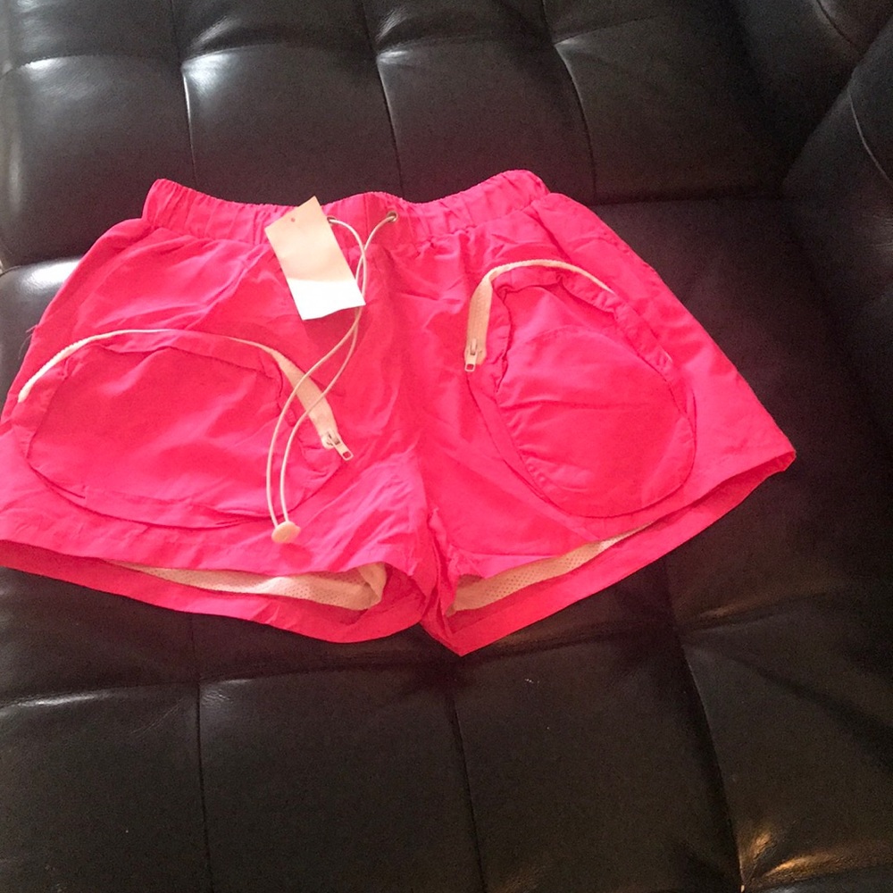 Size large pink shorts.